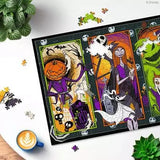 Ravensburger The Nightmare Before Christmas puzzle detail showing the illustrated character panels surrounded by loose jigsaw pieces