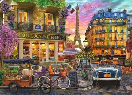Ravensburger Paris at Dawn 1000 piece jigsaw puzzle artwork close up showing the Eiffel Tower, boulangerie, bicycles and a parked car