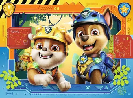 Ravensburger Paw Patrol Dino Movie jigsaw with Rubble and Chase in a dinosaur scene