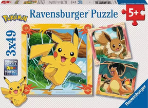 Ravensburger Pokémon 3 x 49 piece jigsaw puzzles box front showing Pikachu, Eevee and Charizard with a 5+ age mark