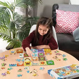 Child building the Ravensburger Pokémon Faces jigsaw puzzle on a table with loose pieces around it
