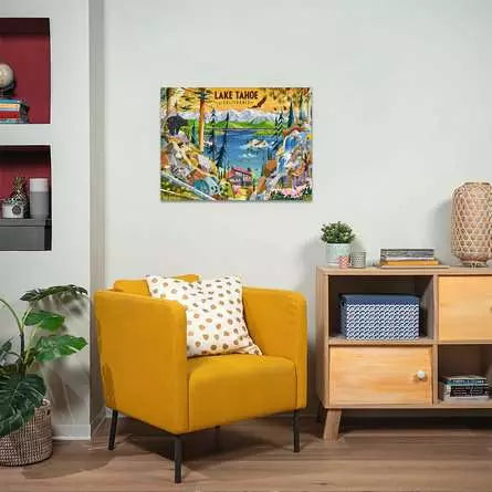 Completed Sacred Lake Tahoe jigsaw puzzle displayed on a wall above a yellow chair
