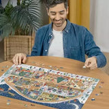 Man assembling the Ravensburger Santa's Workshop jigsaw puzzle on a table with loose pieces around the festive workshop scene