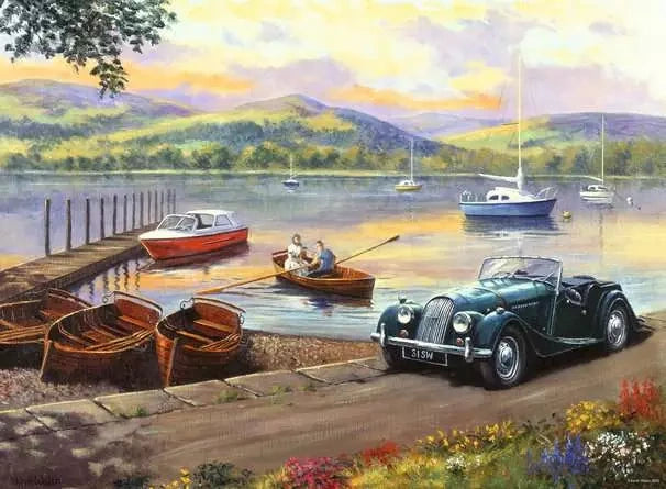 Ravensburger Stop at the Lakes puzzle artwork showing a vintage green car beside a lake with rowing boats, sailing boats and mountains