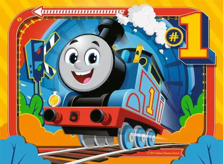 Thomas smiling on the tracks in front of a blue tunnel