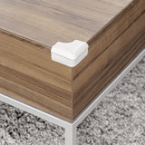 Reer Soft Corner Protector fitted to a wooden table corner