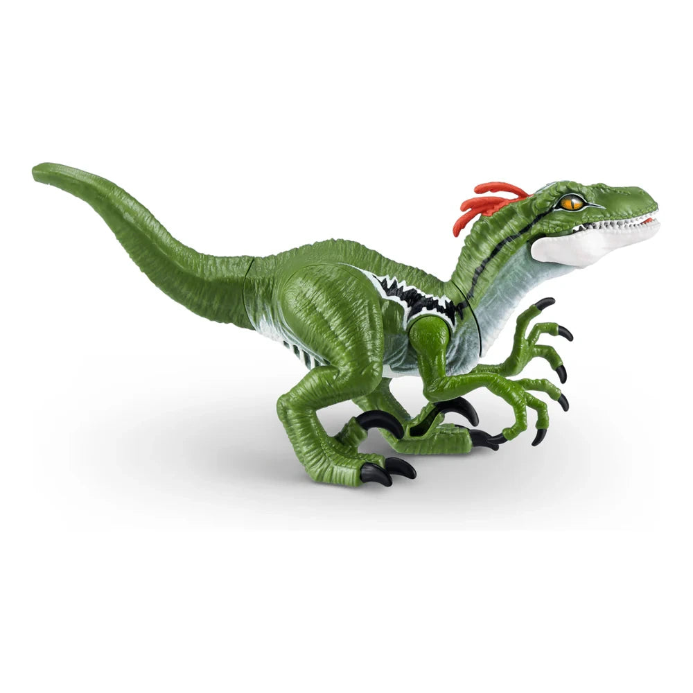 Robo Alive Dino Action Raptor toy side profile showing green body, white chest, black stripe detail and raised claws
