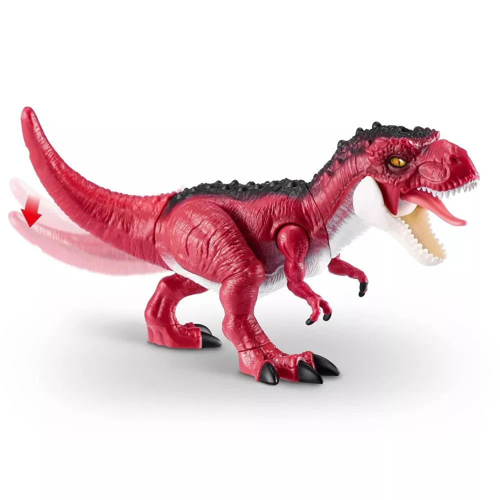 Robo Alive Dino Action T-Rex toy figure with open mouth, visible teeth and tongue, and motion blur arrow indicating tail activation