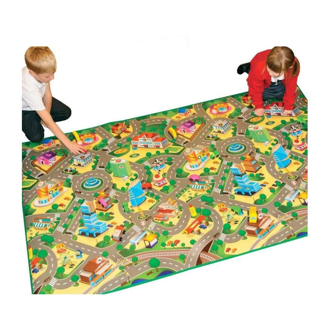 Two children playing on a large Rollmatz City Playmat featuring colourful streets, buildings, road junctions and miniature vehicles