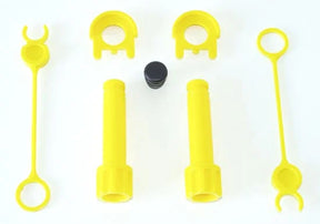 Yellow Rolly loader assembly parts laid out on a white background including connectors and pins