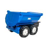 Rear angled view of the blue Rolly Halfpipe trailer showing the twin axle and tailgate on a white background
