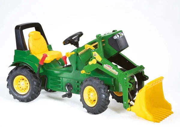 Rolly Farmtrac John Deere 7930 ride on tractor toy with yellow front loader and large pneumatic tyres shown from the side