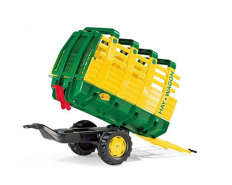 Rolly Hay Wagon trailer tipped upward showing dumping action – Ireland