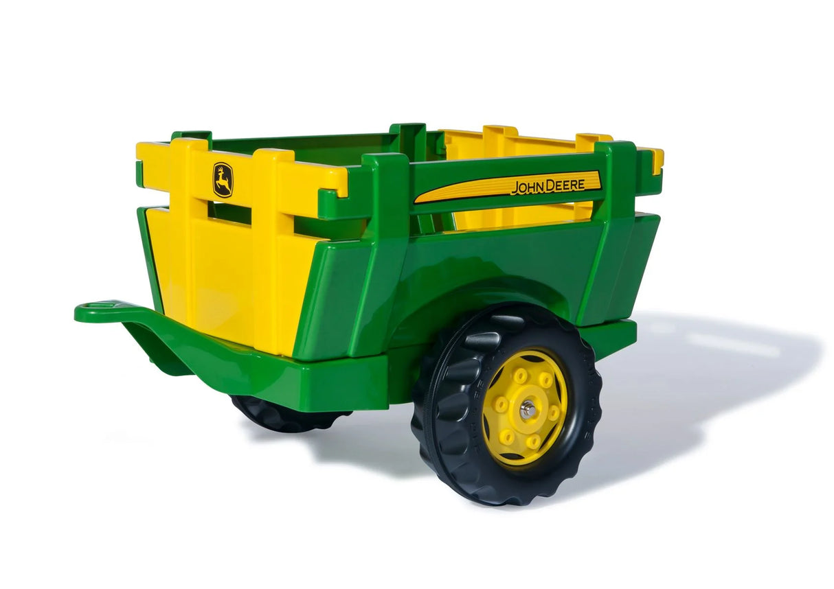 Rolly John Deere pedal tractor farm trailer with green body, yellow panels, rear gate and tow bar on a clean white background