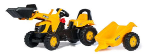 Yellow Rolly Kid JCB pedal tractor with a detachable matching trailer displayed on a white background.