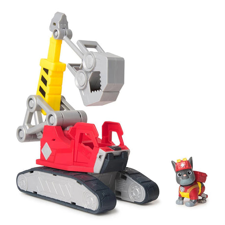 Rubble & Crew Charger’s Deluxe Tools Vehicle shown with Charger figure beside the crane vehicle