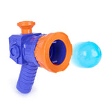 Detached purple and orange Mega Blaster launching the translucent blue ball from its circular barrel
