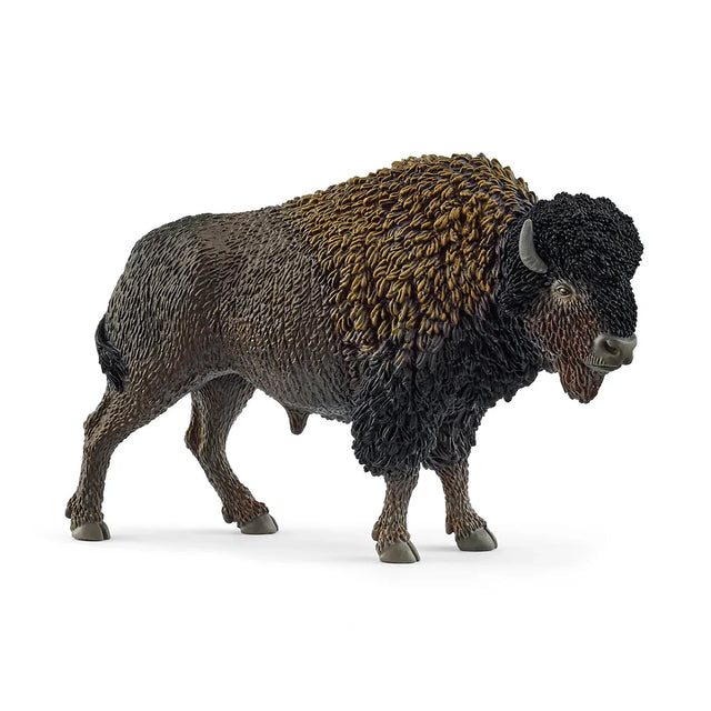 Schleich Bison figure shown from the side with a textured dark brown coat, shoulder hump, short grey horns and one rear leg raised