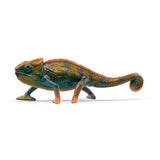 Schleich Chameleon figure shown from the side with green, brown and orange colouring, clawed feet and a tightly curled tail