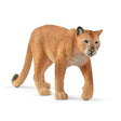 Schleich Cougar figure with a pale chest, dark nose, dark-tipped ears and one front paw raised. 