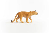 Schleich Cougar figure with a pale muzzle, dark nose, long tail and one front paw raised.
