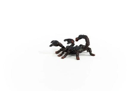 Schleich Emperor Scorpion figure viewed from a rear angle with a raised tail, ridged back and red brown leg tips