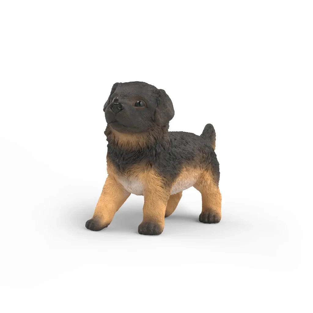 Schleich German Shepherd Puppy figure with black and brown coat
