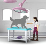 Schleich Happy Horse Hospital 42787 treatment table scene with Mrs Kramer and overhead operating lamp