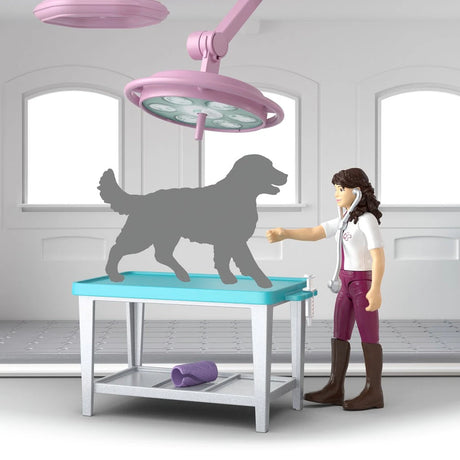 Schleich Happy Horse Hospital 42787 treatment table scene with Mrs Kramer and overhead operating lamp