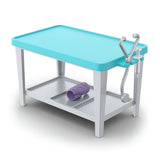 Schleich Happy Horse Hospital 42787 blue treatment table with veterinary accessories on the lower shelf