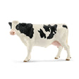 Schleich Holstein Cow figure with black patches across its white body, a pale pink muzzle and black ears