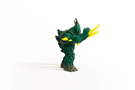 Side profile of the Schleich Jungle Emperor figure with its long yellow claws extended forward