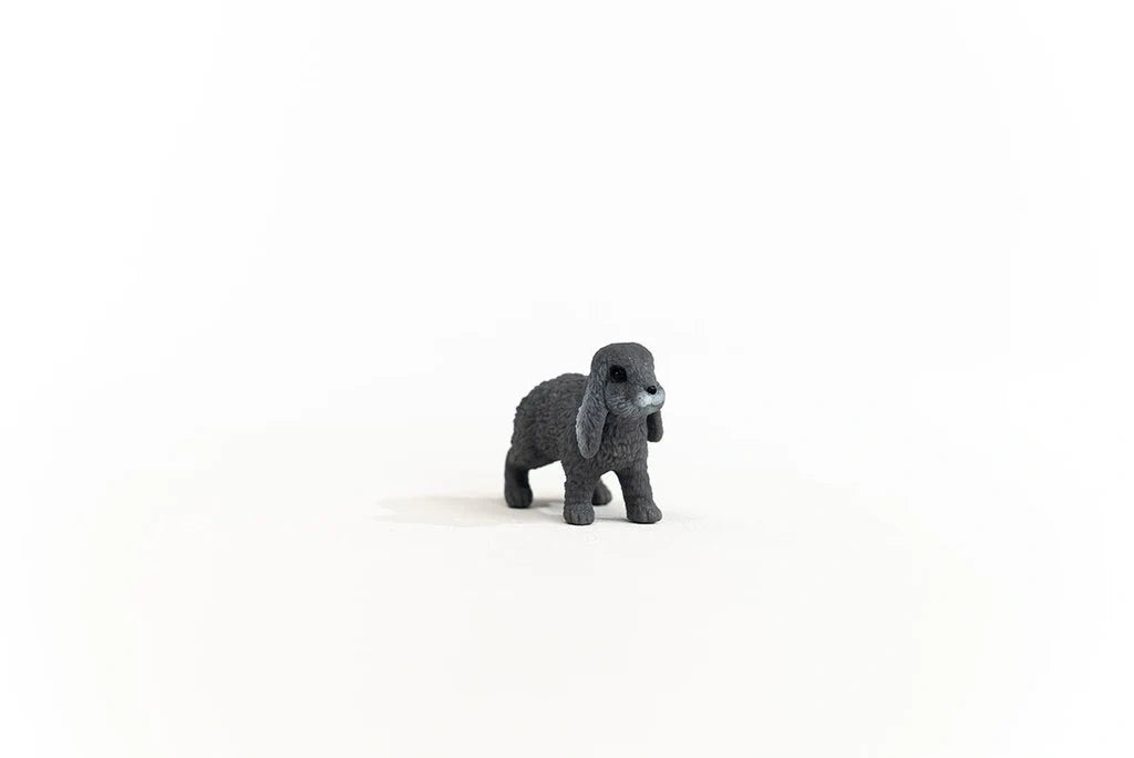 Schleich Lop-Eared Rabbit figure facing forward with black eyes and both long ears hanging beside its face