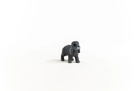 Schleich Lop-Eared Rabbit figure facing forward with black eyes and both long ears hanging beside its face