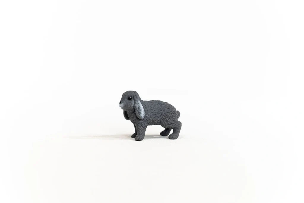 Schleich Lop-Eared Rabbit figure shown from the left side with both long ears hanging beside its face