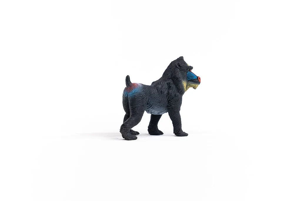 Schleich Mandrill figure with blue cheek markings, a red muzzle, dark fur and blue and red colouring across the hindquarters.