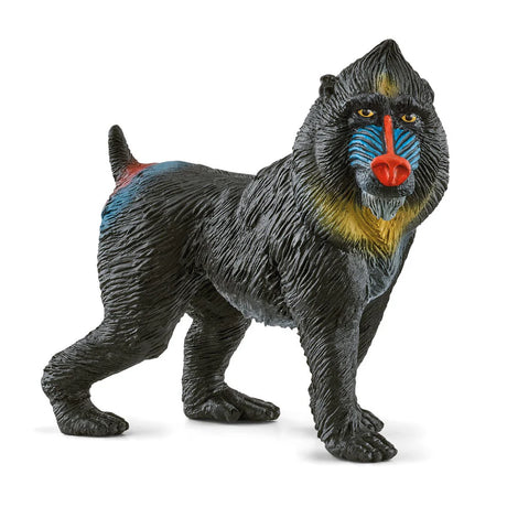 Schleich Mandrill figure with dark textured fur, yellow eyes, a red muzzle, blue facial markings and yellow colouring around the neck.