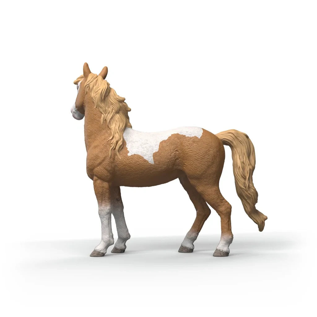 Schleich Mustang Mare figure shown from the left side with brown and white coat and cream tail