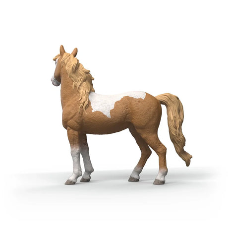 Schleich Mustang Mare figure shown from the left side with brown and white coat and cream tail