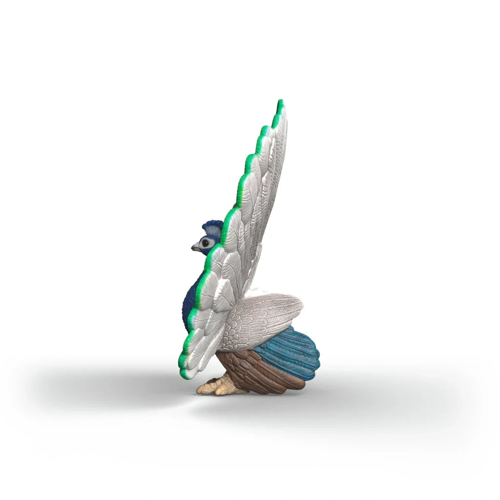 Rear view of the Schleich Peacock figure with its tail feathers spread