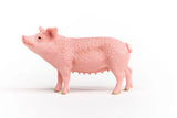 Schleich Pig figure shown from the left side with a raised snout, textured body and curled tail.