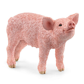 Schleich Piglet figure in close view with a raised snout, black eyes and textured pink body.