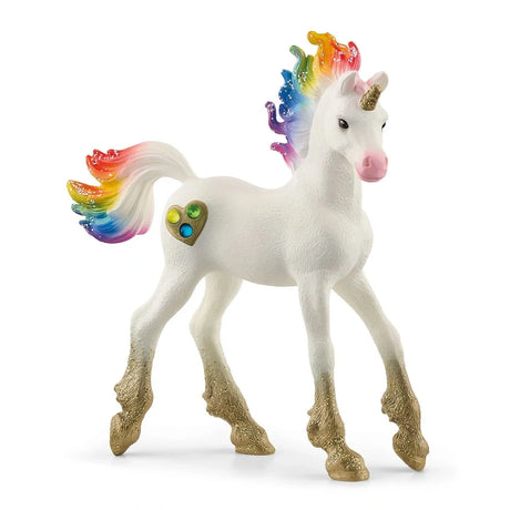 Schleich Rainbow Love Unicorn Foal figure with a white body, rainbow-coloured mane and matching rainbow tail