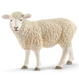 Schleich Sheep figure with thick curled white fleece, black eyes and a pale pink nose