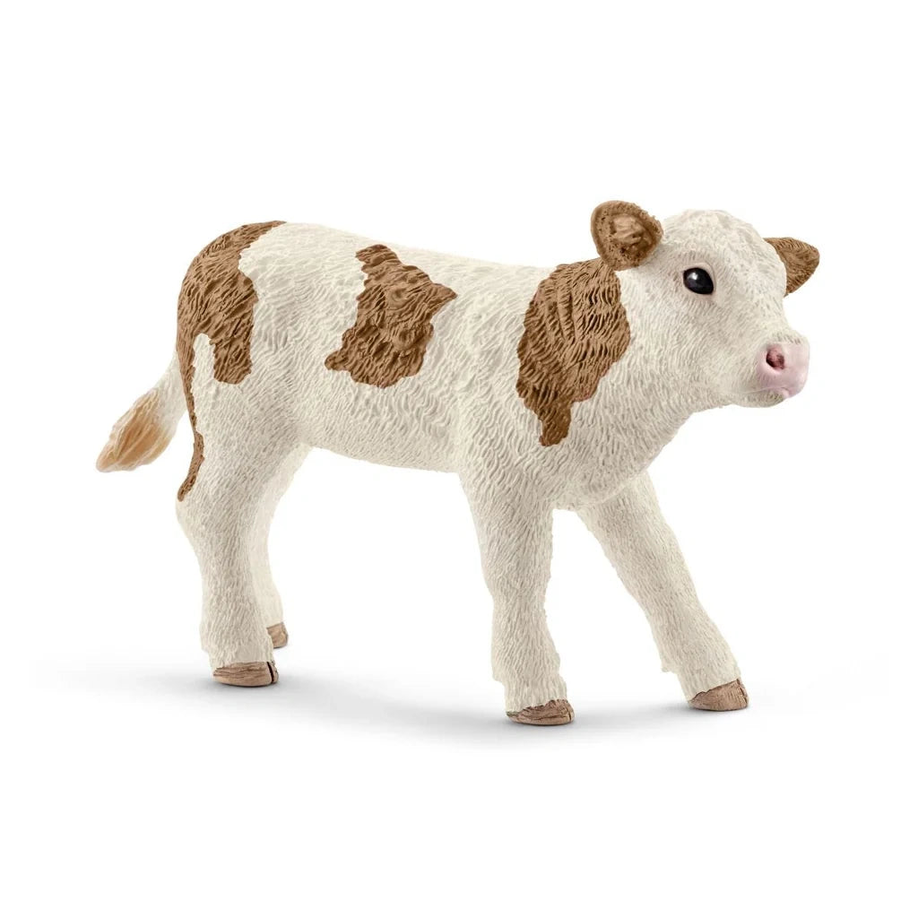 Schleich Simmental Calf figure shown from the side with brown patches across its white body and one front leg extended