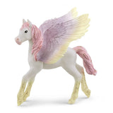 Schleich Sunrise Pegasus Foal figure with pink mane, pastel wings and yellow lower legs