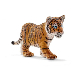 A small tiger cub figurine with bright blue eyes and detailed orange and black striping shown in a walking pose.
