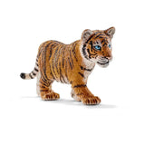 A close view of the tiger cub figurine highlighting its painted stripes, blue eyes, and textured fur.