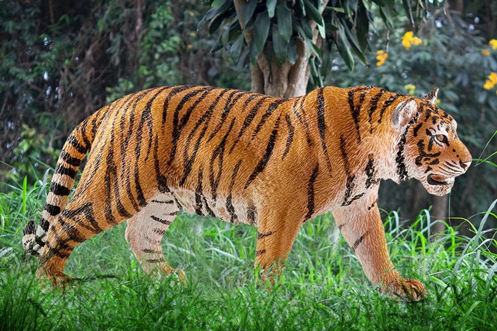 Schleich tiger figure showing realistic striping, muscular build, textured fur and a focused walking stance.