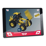 Tablet screen showing a 3D assembly step for a yellow and black haul truck model.